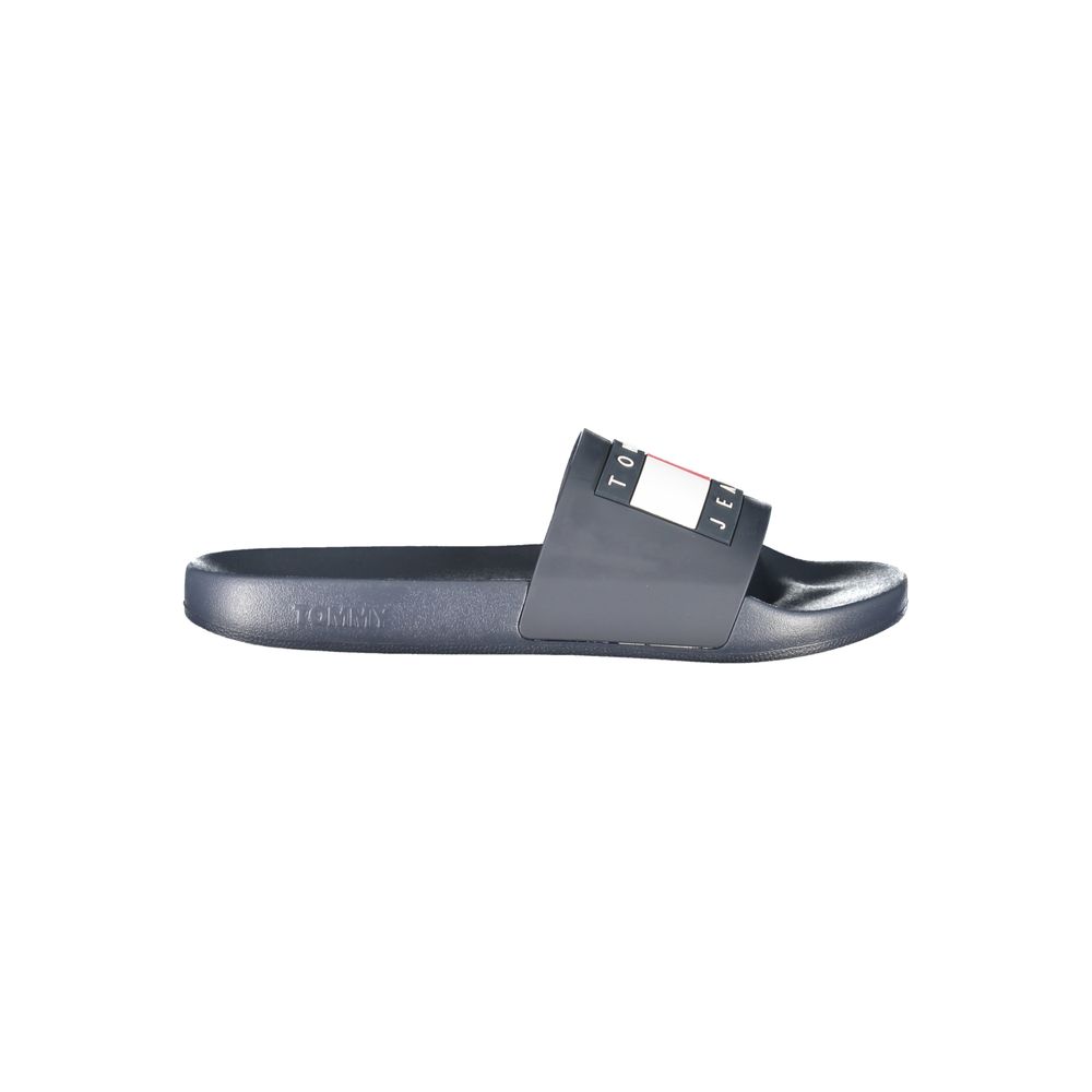 Pantoufles hommes Tommy Hilfiger en polyurethane bleu, confortables et élégantes, avec logo de la marque visible.