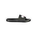 Pantoufles noires en polyuréthane Tommy Hilfiger pour homme, avec design élégant et confort visible sur l'image.