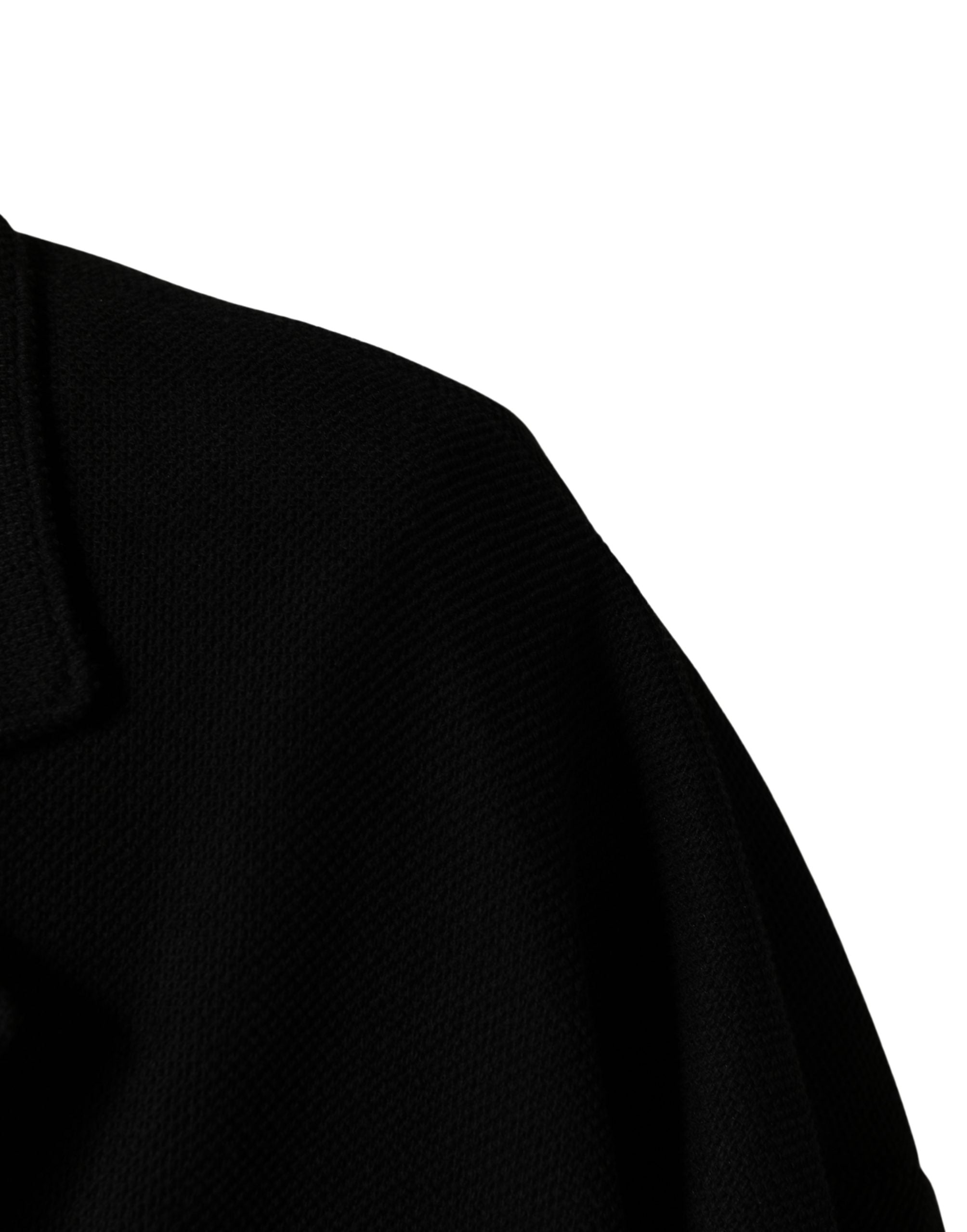 Veste de costume noire Dolce & Gabbana à double boutonnage avec deux boutons, style élégant et sophistiqué.