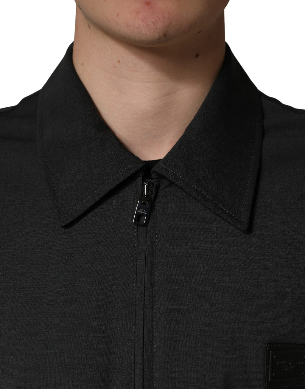 Veste bomber homme Dolce & Gabbana en laine noire avec logo, fermeture éclair complète, style élégant et décontracté.
