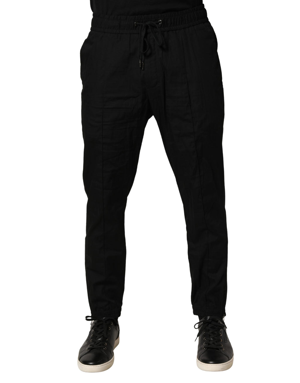 Pantalon jogger homme Dolce & Gabbana en coton noir, coupe skinny, style décontracté et moderne.