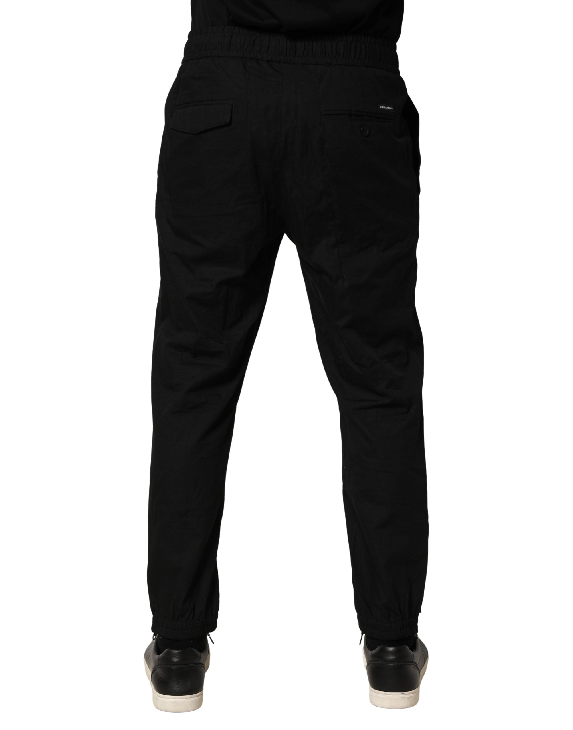 Pantalon jogger homme Dolce & Gabbana en coton noir, coupe skinny, style décontracté et moderne.