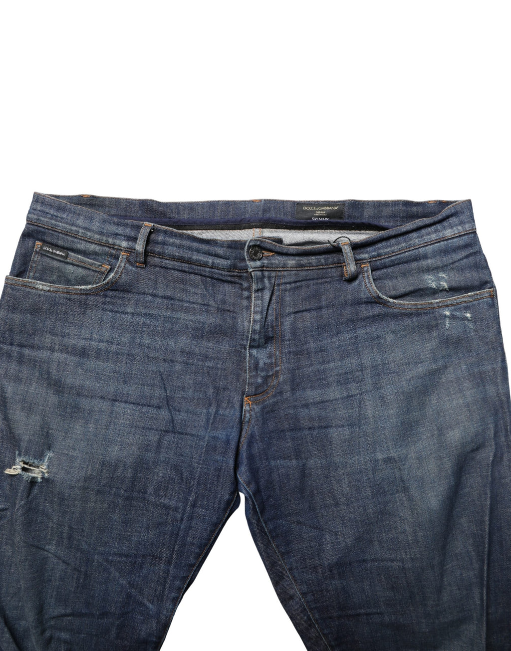 Jeans skinny en coton denim bleu foncé délavé de Dolce & Gabbana, coupe ajustée et détails classiques.