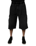 Shorts bermuda en jean noir Dolce & Gabbana, taille mi-haute, avec poches cargo, style décontracté et tendance.