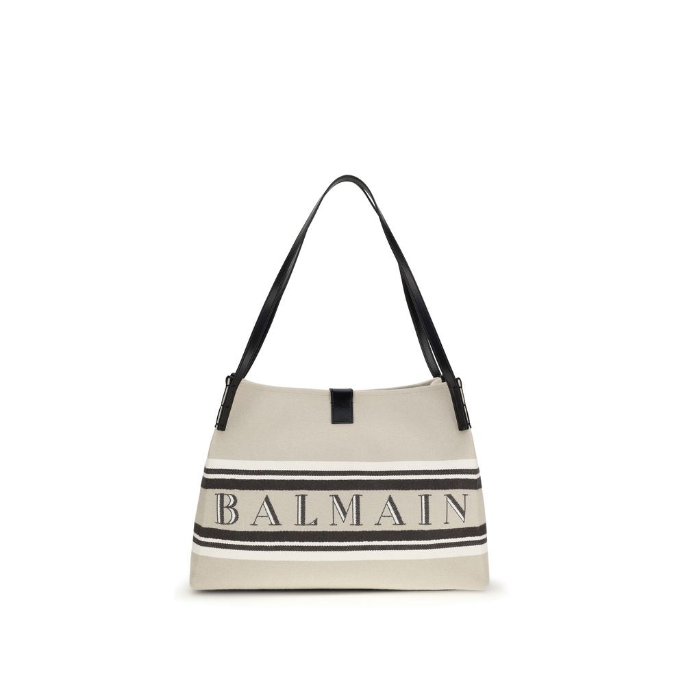 Sac à épaule en coton multicolore de Balmain avec logo emblématique et design élégant, visible dans l'image.