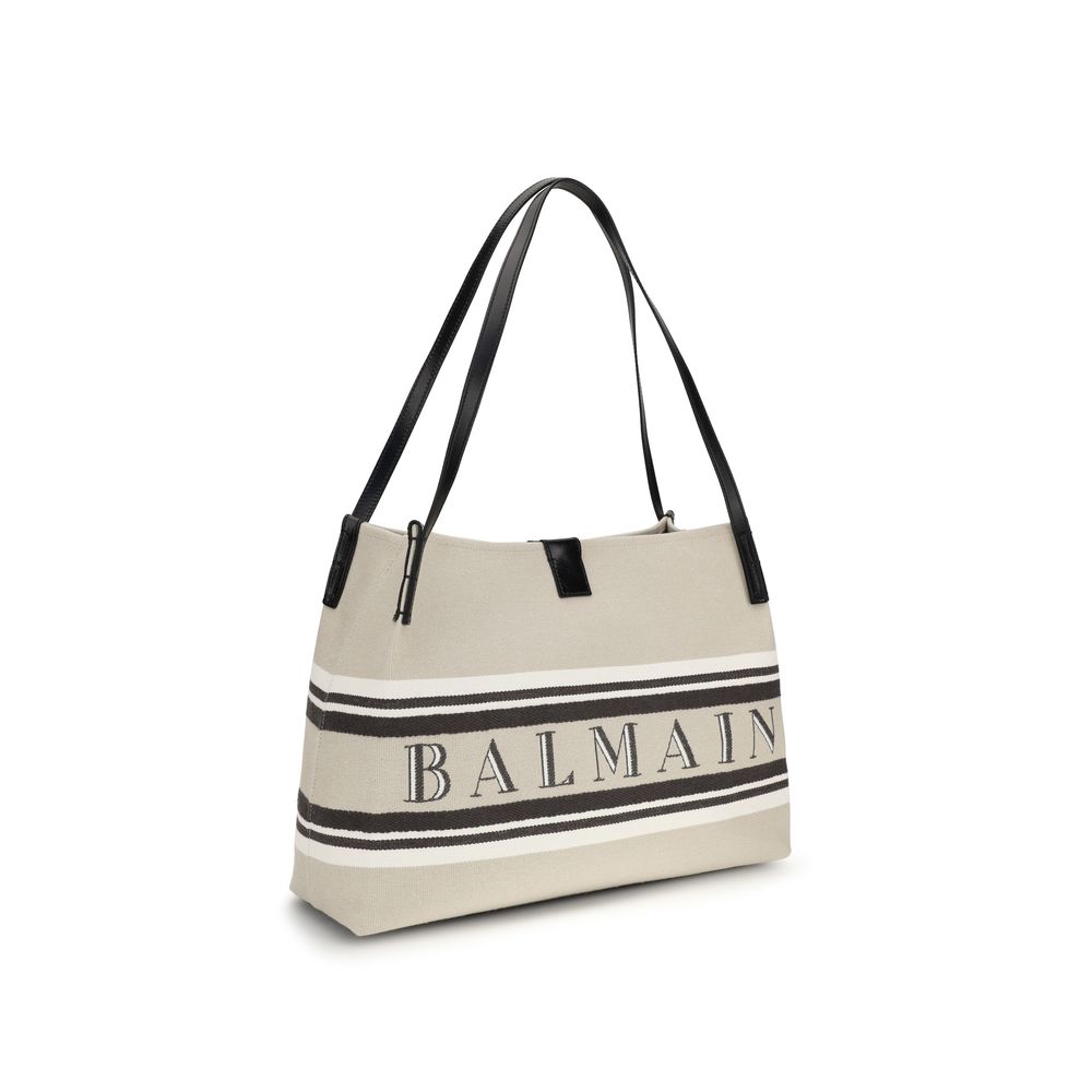 Sac à shoulder Balmain en coton multicolore avec logo, détails colorés et design élégant visible sur l'image.