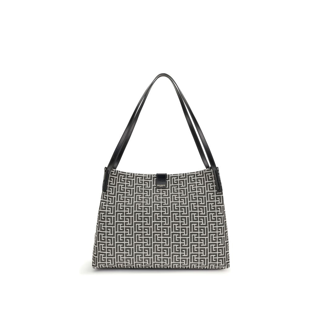 Sac à main Balmain en coton noir avec bandoulière, style élégant et moderne, idéal pour compléter une tenue sophistiquée.