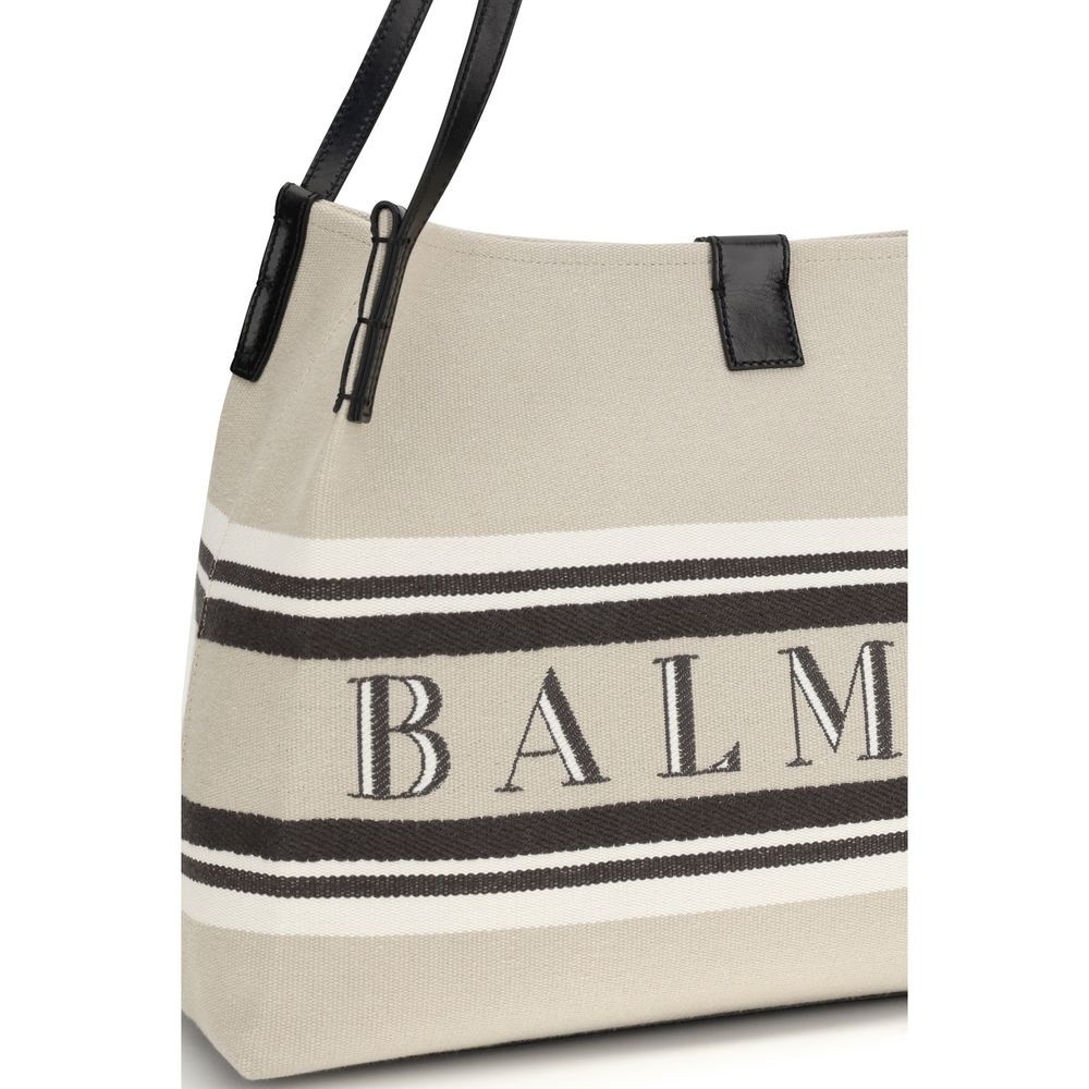 Sac à main Balmain multicolore en coton avec bandoulière, détail coloré et design élégant visible sur l'image.