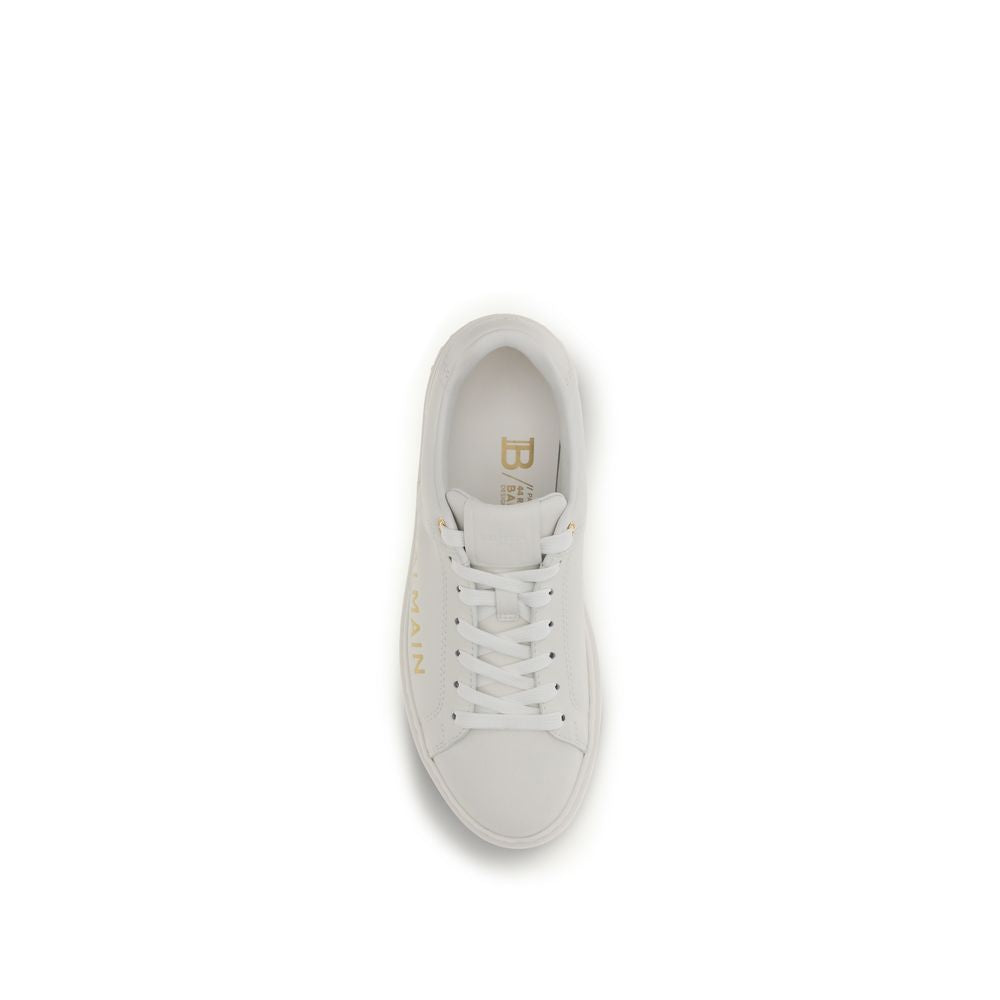 Basket Balmain en cuir de veau blanc et basse top Bos Taurus, chaussures sneakers élégantes et tendance.