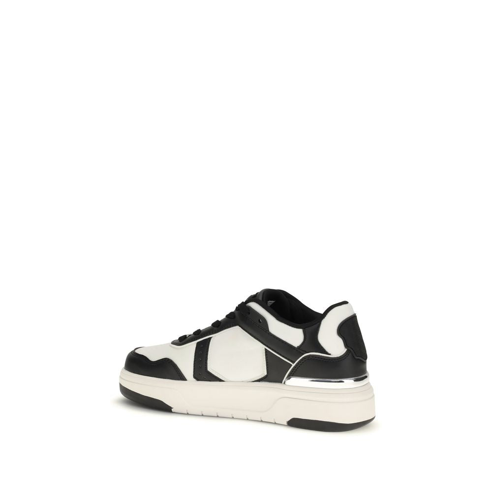 Sneakers Philipp Plein en cuir de veau noir Bos Taurus, chaussures athlétiques modernes, vue de face sur fond neutre.