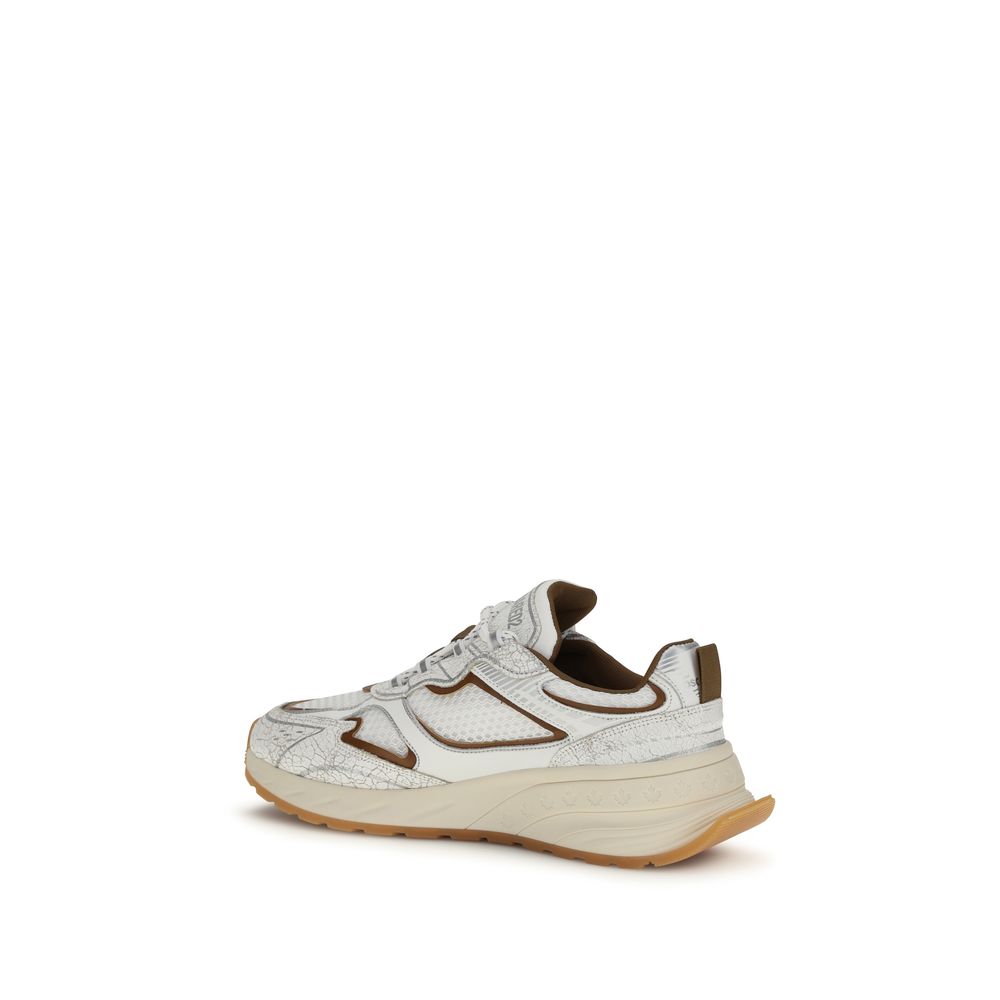 Sneakers athlétiques blanches en cuir de veau Bos Taurus de Dsquared², vue de côté avec détails en cuir blanc et semelle blanche.
