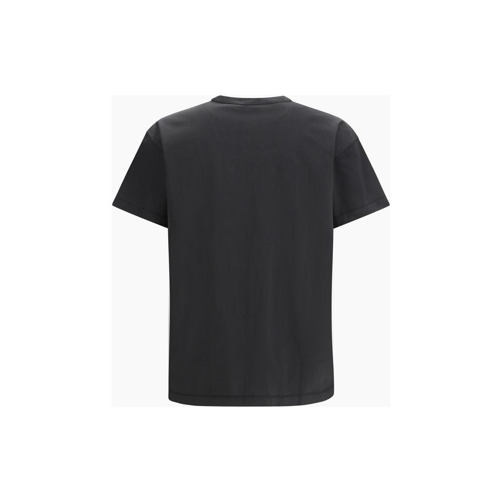T-shirt en coton noir de la marque Diesel, coupe classique, portant un logo Diesel sur la poitrine.