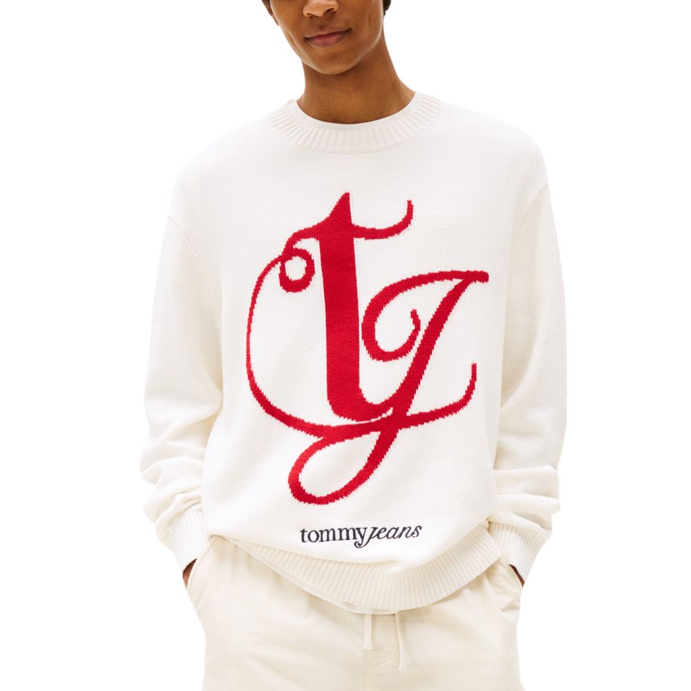 Pull à manches longues Tommy Hilfiger Jeans en coton recyclé couleur crème, visible avec logo et détails de couture.