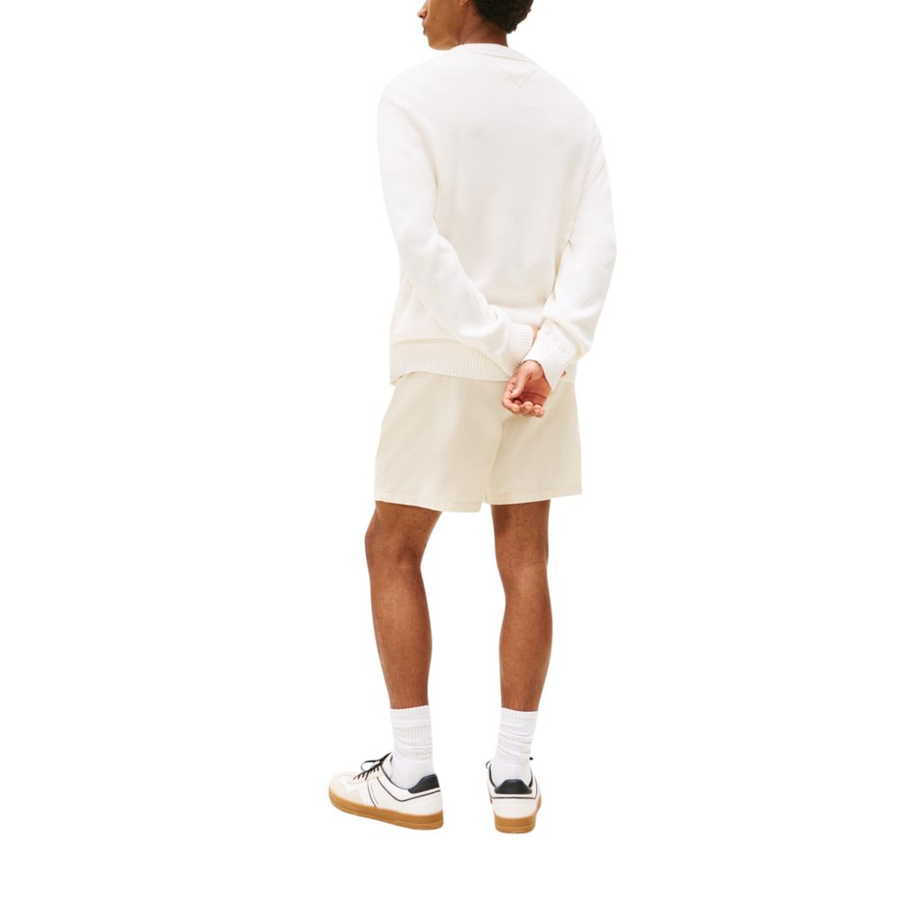 Pull-over Tommy Hilfiger Jeans en coton recyclé crème avec logo brodé, style décontracté et écologique.