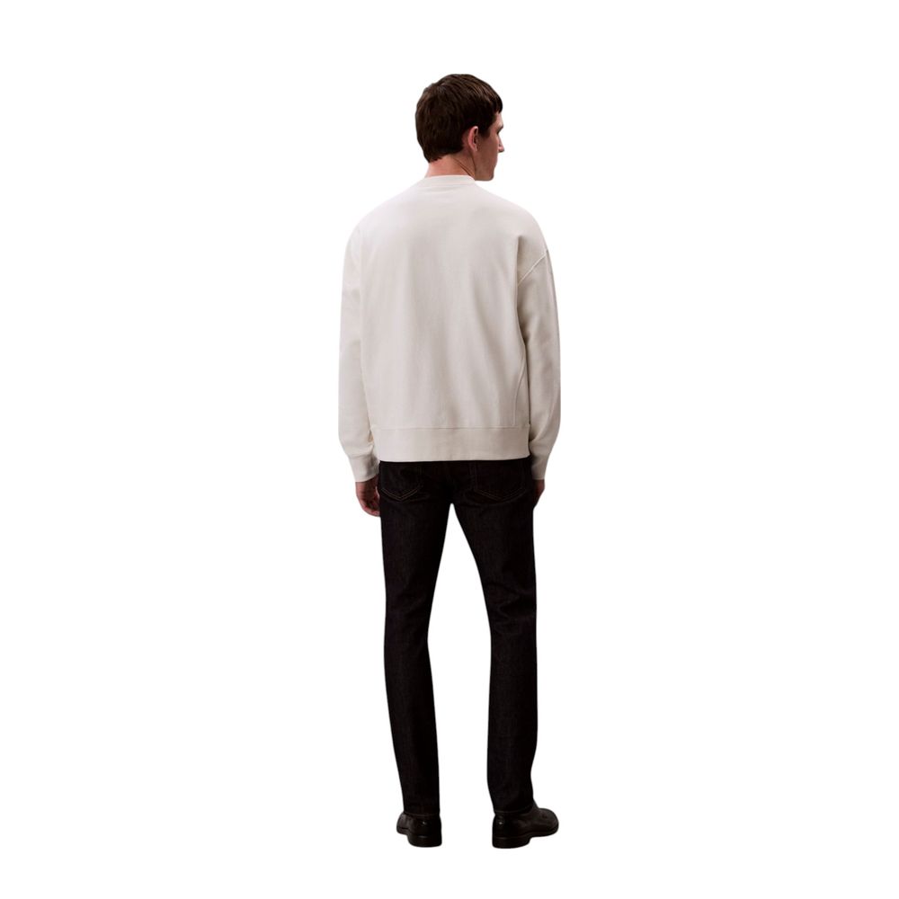 Sweatshirt en coton blanc de Calvin Klein Jeans, style décontracté, avec logo discret visible sur le devant.