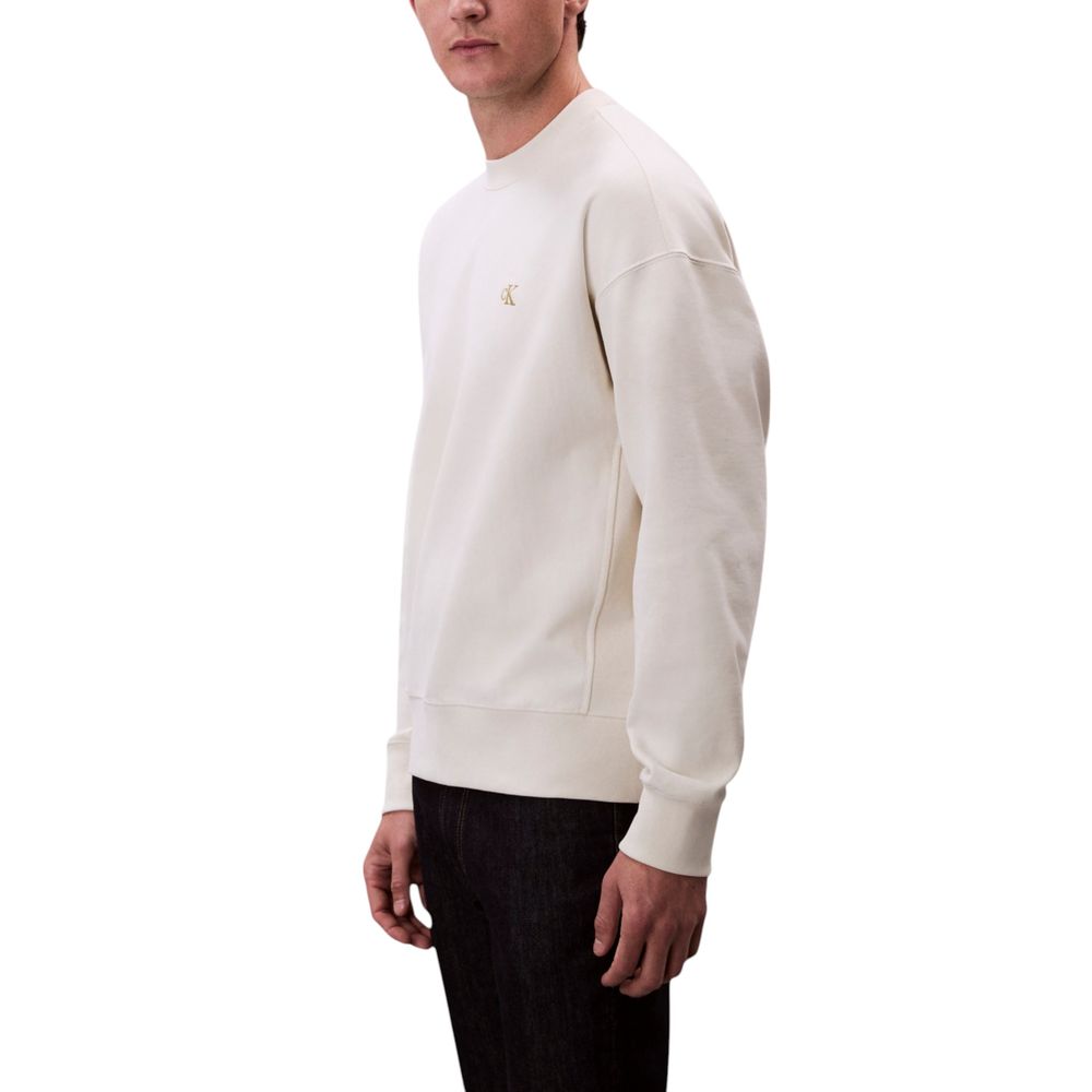 Sweat-shirt en coton blanc de la marque Calvin Klein Jeans, vue de face, avec logo discret sur la poitrine.