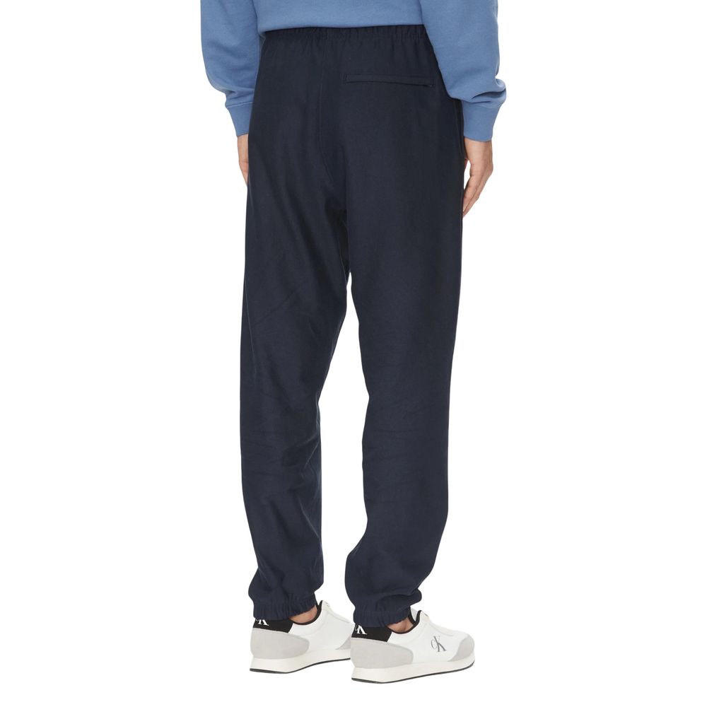 Pantalons de jogging en coton bleu de Calvin Klein Jeans, coupe décontractée et confortable pour le sport ou la détente.