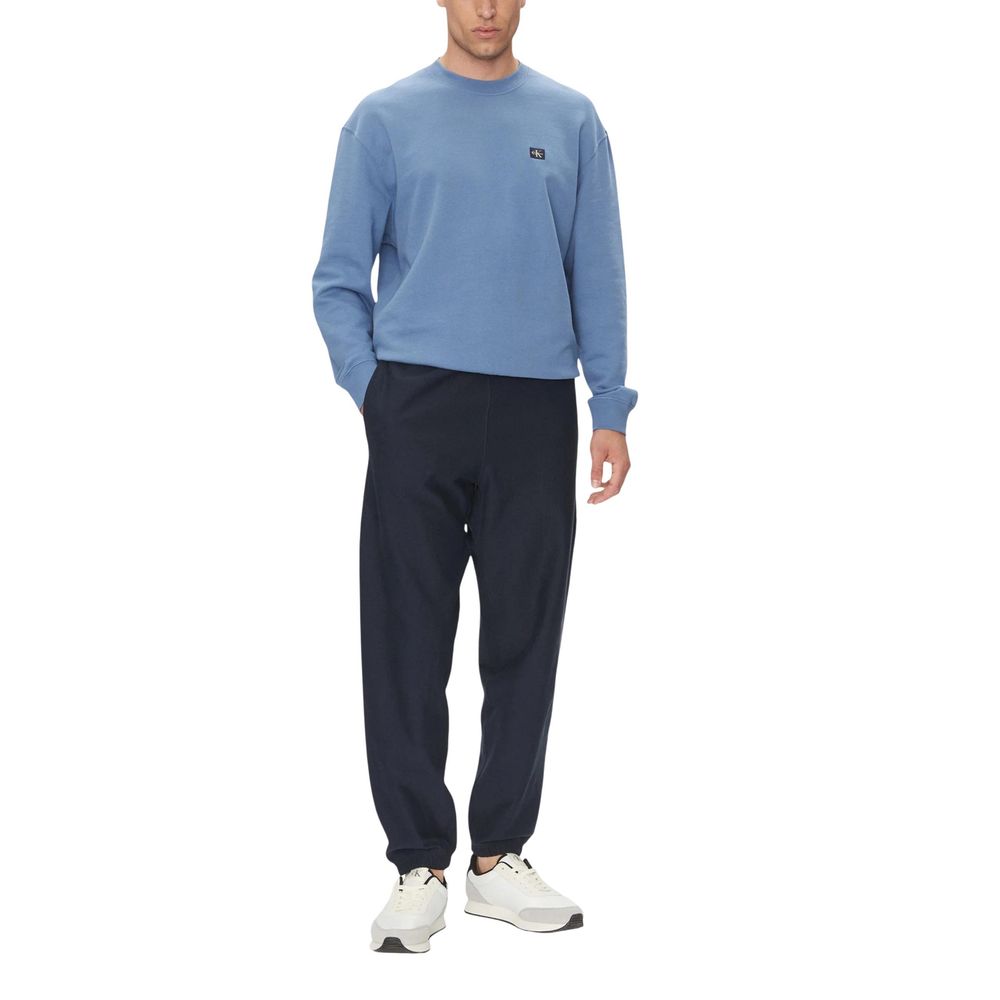 Pantalons de jogging en coton bleu de Calvin Klein Jeans, vêtements d'entraînement confortables et décontractés.