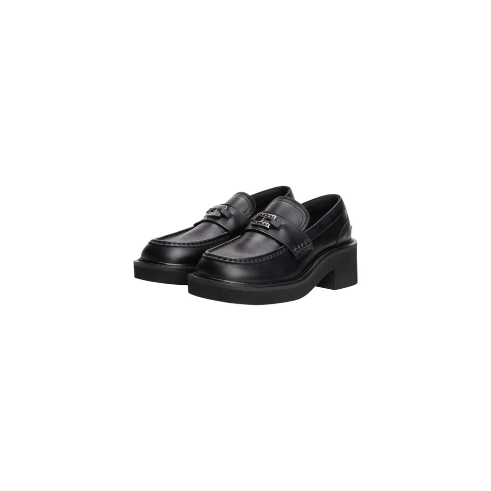 Chaussures à talons hauts en cuir noir de Tommy Hilfiger Jeans, élégantes et modernes, visibles avec détails en cuir et finition soignée.