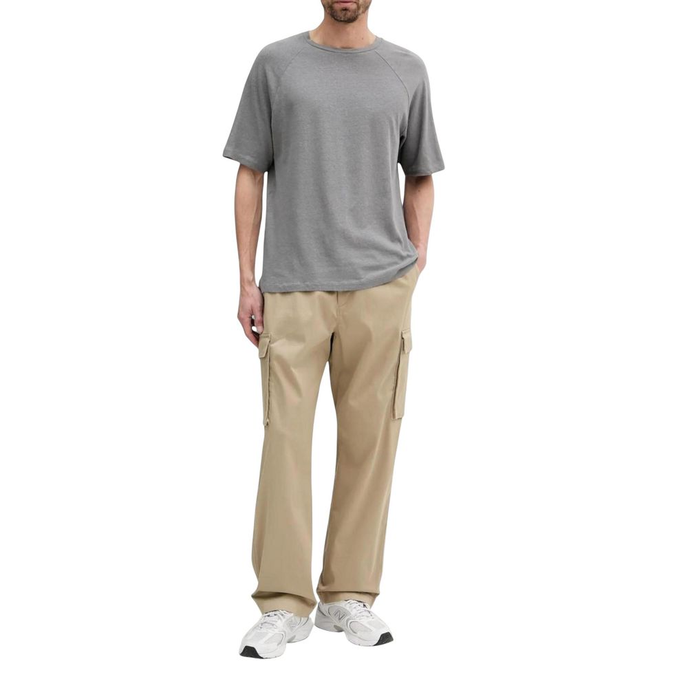 Pantalon cargo beige en coton de Calvin Klein Jeans, style décontracté avec poches latérales et taille ajustable.