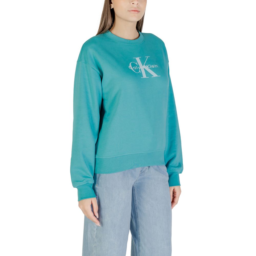 Sweat-shirt en coton bleu de la marque Calvin Klein Jeans, vue de face, avec logo discret sur la poitrine.