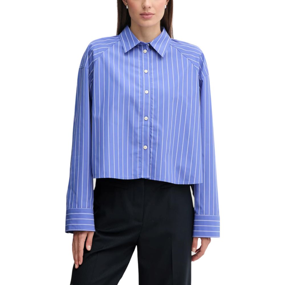 Chemise en coton bleu de Calvin Klein Jeans, style décontracté, avec col et manches longues, vue de face.