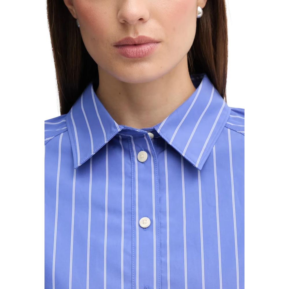 Chemise en coton bleue de Calvin Klein Jeans, coupe élégante, avec col classique et manches longues, vue de face.