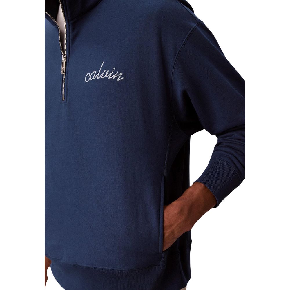 Sweatshirt en coton bleu Calvin Klein Jeans, coupe décontractée, logo discret sur la poitrine, idéal pour un style casual.