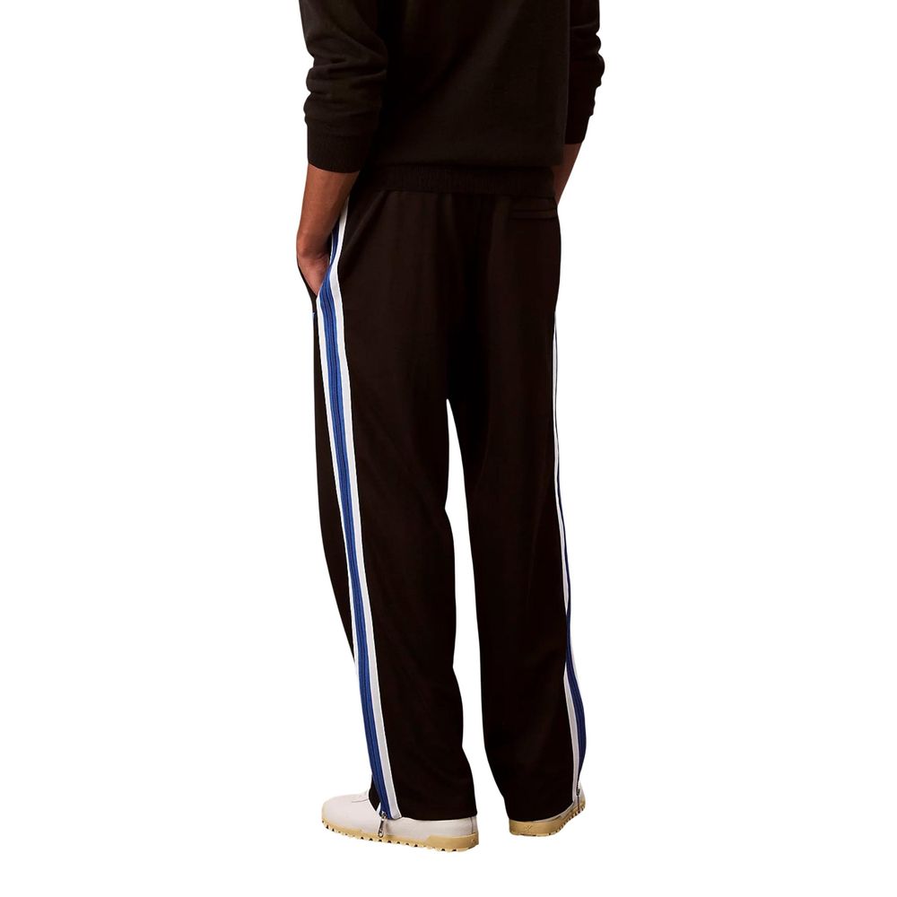 Pantalons de jogging en polyester noir Calvin Klein Jeans pour homme, style décontracté et confortable.