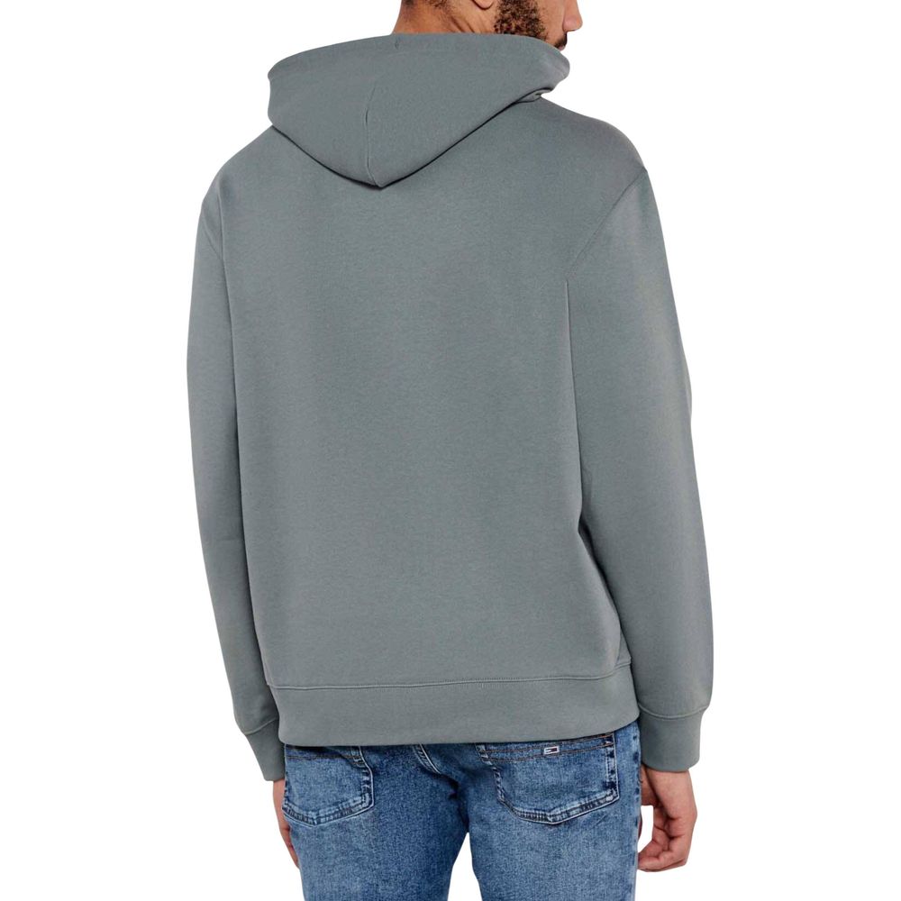 Sweat à capuche gris en coton de Calvin Klein Jeans, vue de face, avec logo discret sur la poitrine.