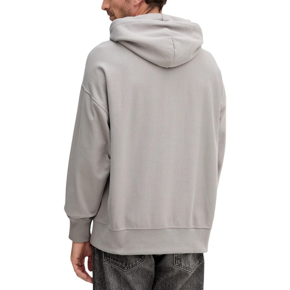 Sweat à capuche gris en coton de Calvin Klein Jeans, doux et confortable, avec logo discret sur la poitrine.