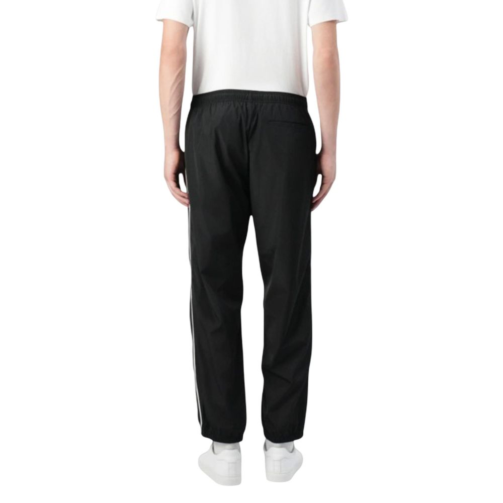 Pantalons de jogging noirs en polyester de Calvin Klein Jeans, vêtements de sport décontractés pour homme ou femme.