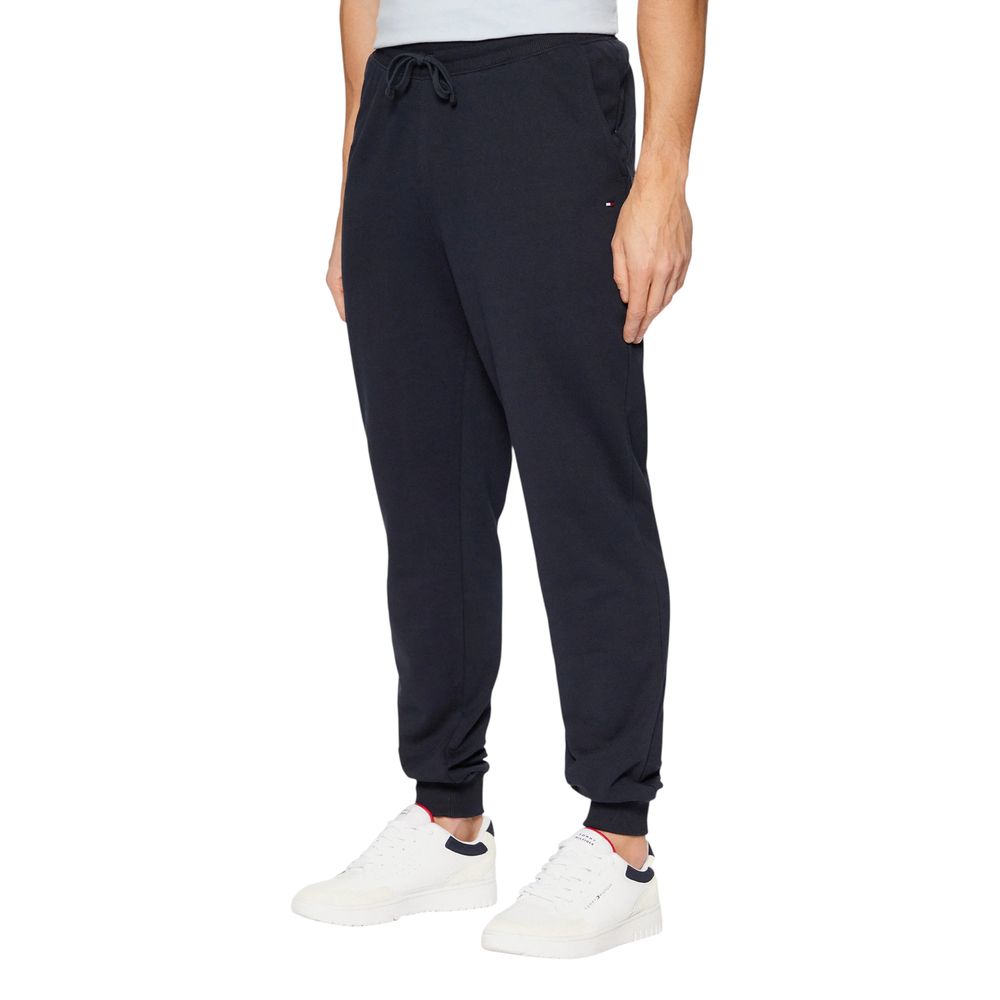 Pantalons de jogging en coton bleu Tommy Hilfiger pour le sport, avec cordon de serrage et logo discret sur la jambe.