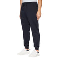 Pantalons de jogging en coton bleu Tommy Hilfiger pour le sport, avec cordon de serrage et logo discret sur la jambe.