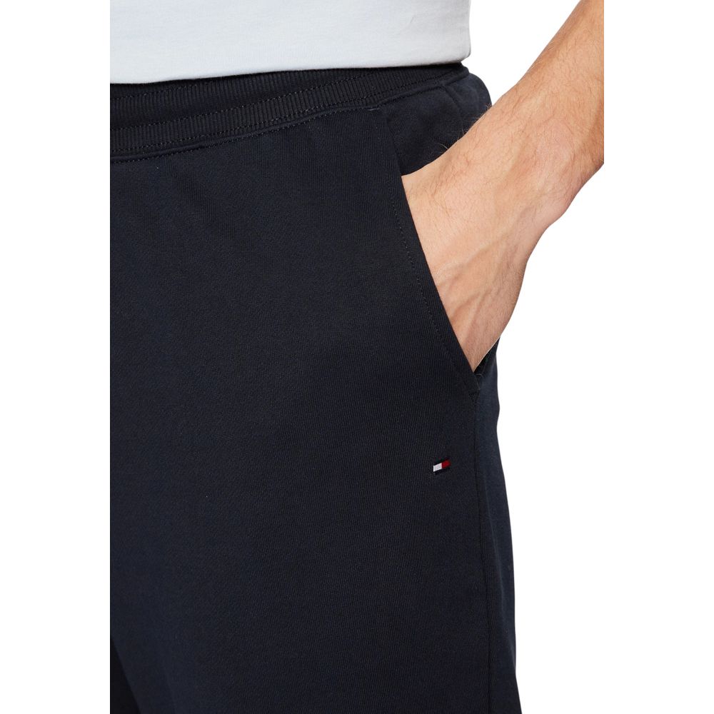 Pantalons de jogging en coton bleu Tommy Hilfiger pour homme, coupe décontractée, avec logo sur la jambe.