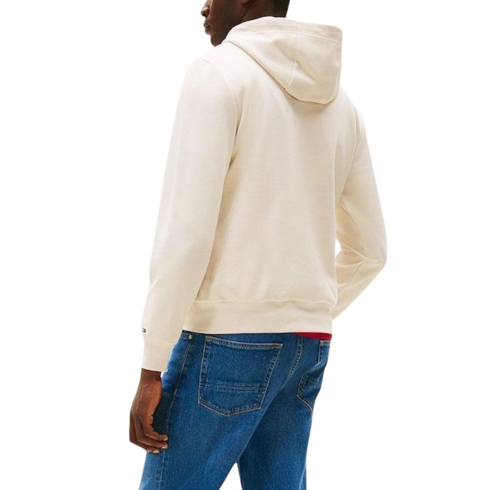 Sweat à capuche en coton bio beige de Tommy Hilfiger, doux et confortable, avec logo discret sur la poitrine.