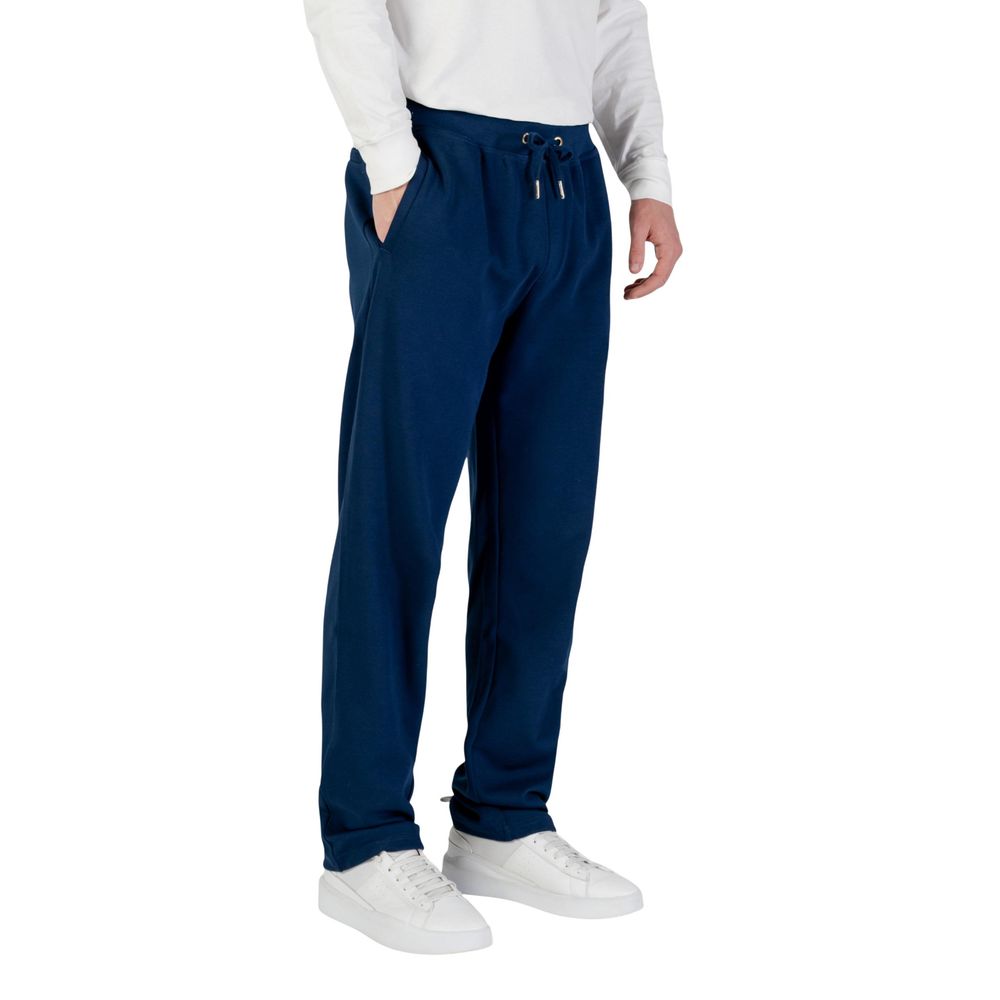 Pantalons de jogging Tommy Hilfiger en coton recyclé bleu, vêtements de sport confortables et écologiques.