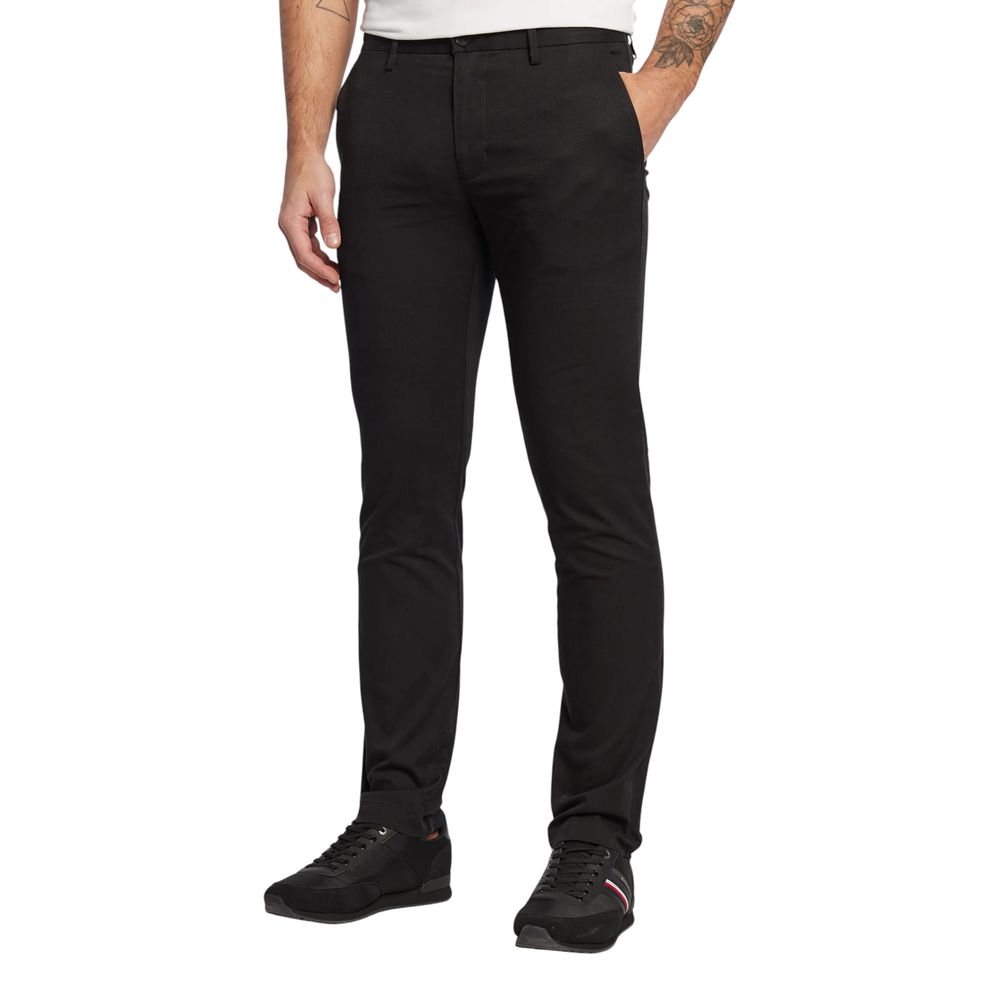 Pantalon skinny en coton recyclé noir de Tommy Hilfiger, coupe ajustée et style moderne.