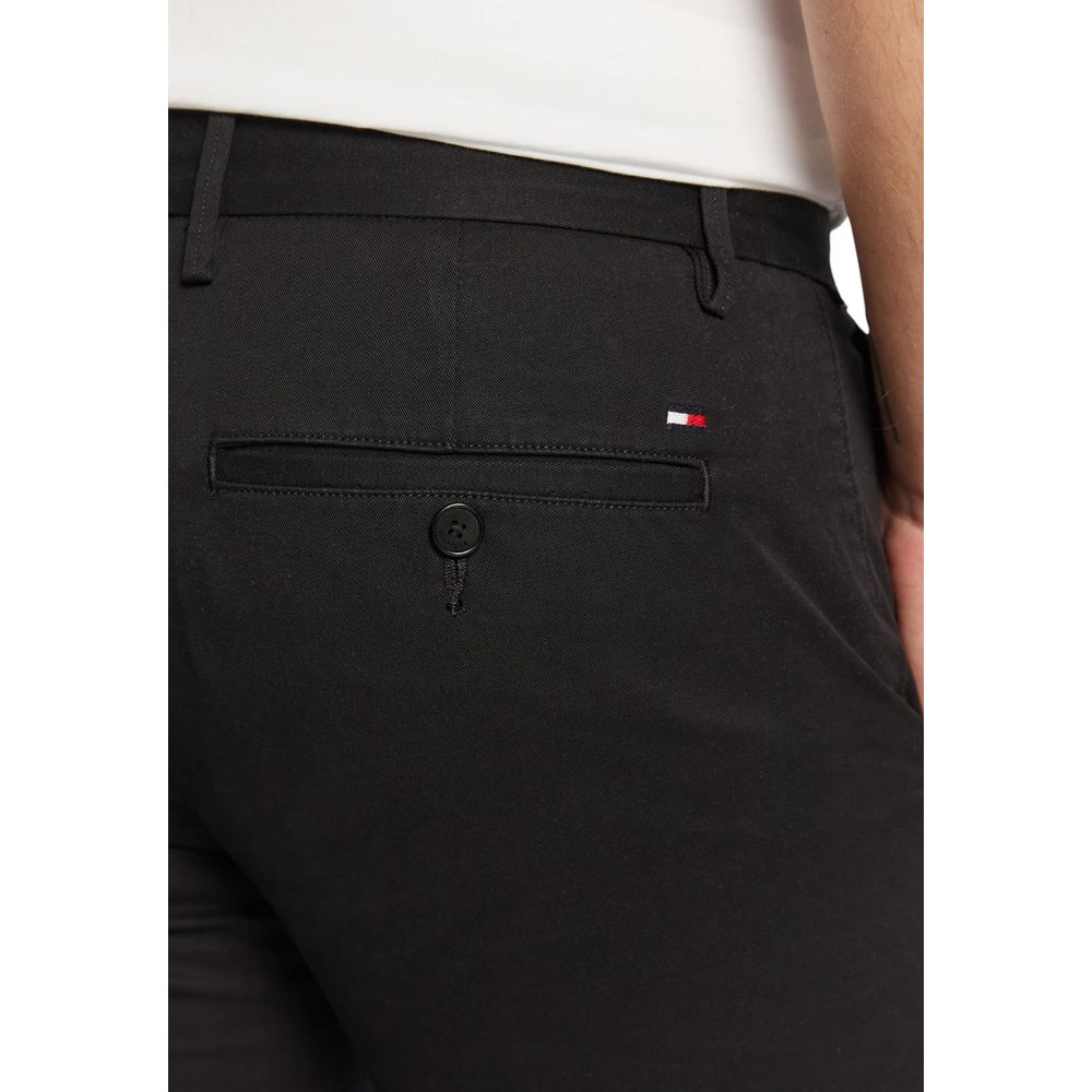 Pantalons skinny en coton recyclé noir de Tommy Hilfiger, coupe ajustée et moderne, visibles sur cette image.