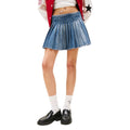 Jupe en jean bleue Tommy Hilfiger Jeans en coton recyclé, coupe mini, style décontracté et écologique visible sur l'image.