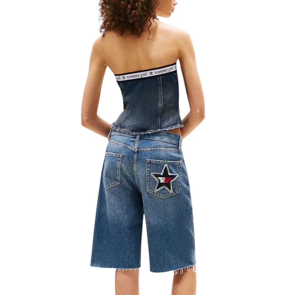 Jean Tommy Hilfiger en coton recyclé bleu, coupe classique, visible avec détails de couture et étiquette de la marque.