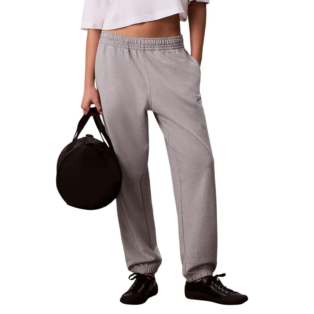 Pantalons de jogging en coton gris de Calvin Klein Jeans, style décontracté pour le sport ou la détente, visibles en gros plan