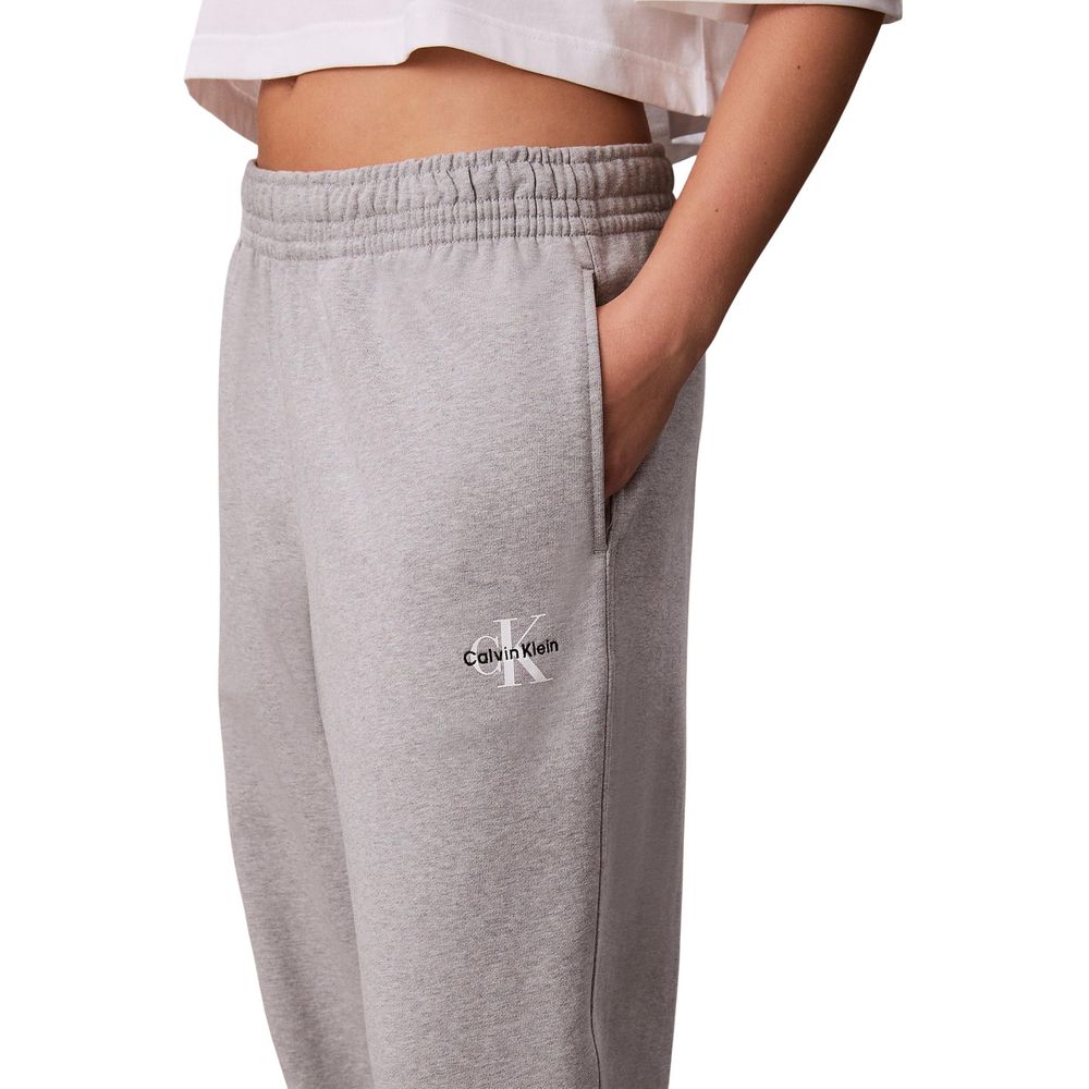 Pantalons de jogging gris en coton de Calvin Klein Jeans, confortables et décontractés pour le sport ou la détente.