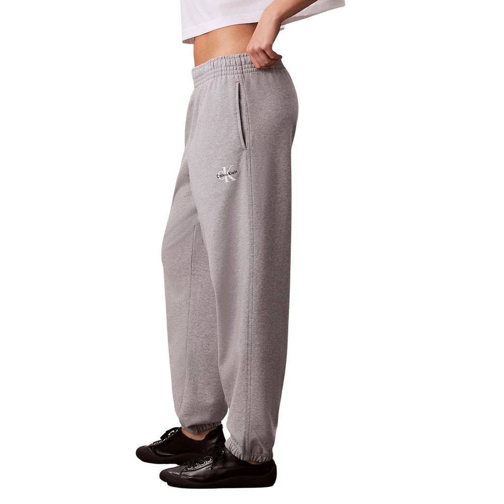 Pantalons de jogging en coton gris de Calvin Klein Jeans pour homme, confortables et décontractés, visibles sur l'image.