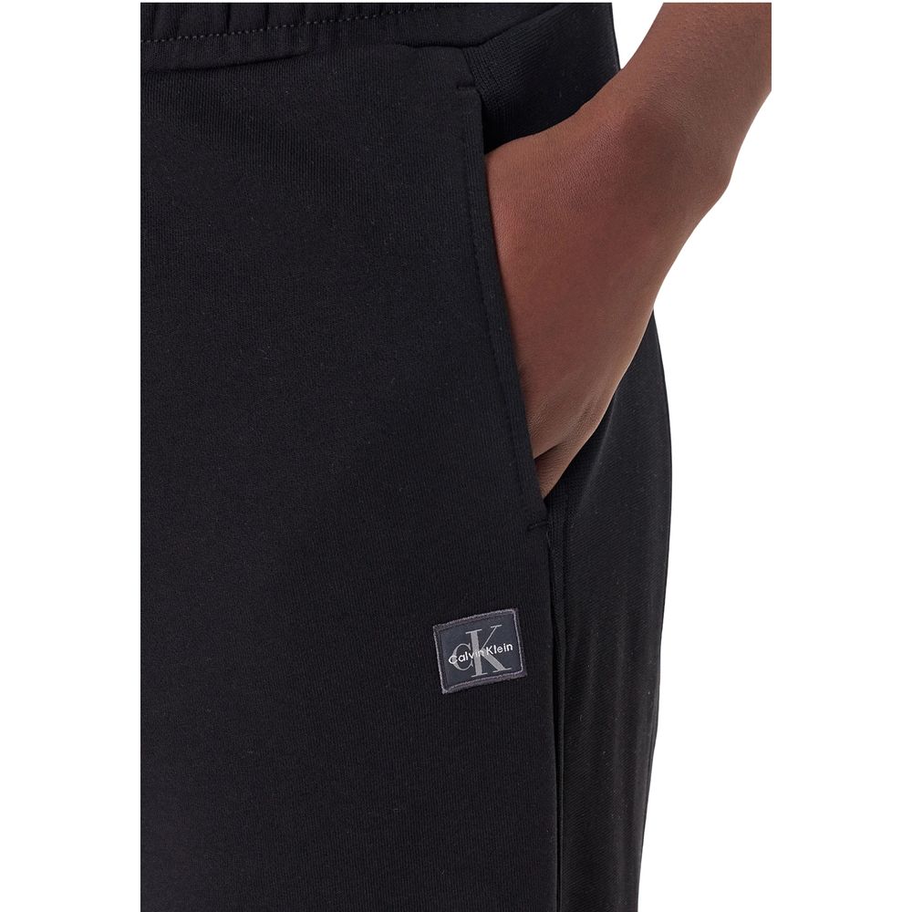 Pantalons de jogging en coton noir Calvin Klein Jeans, look décontracté, avec taille élastique et poches latérales.