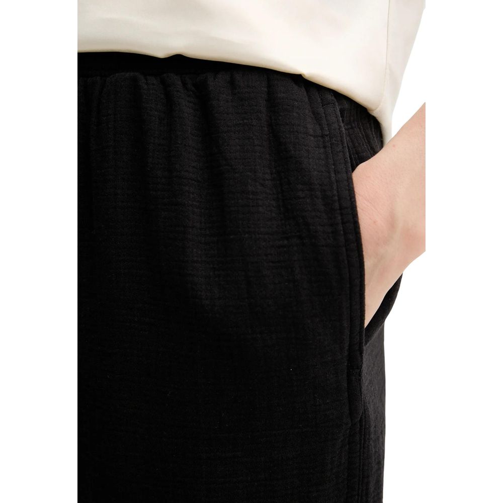 Pantalons joggers en coton noir de Calvin Klein Jeans, confortables et décontractés pour le sport ou le quotidien.