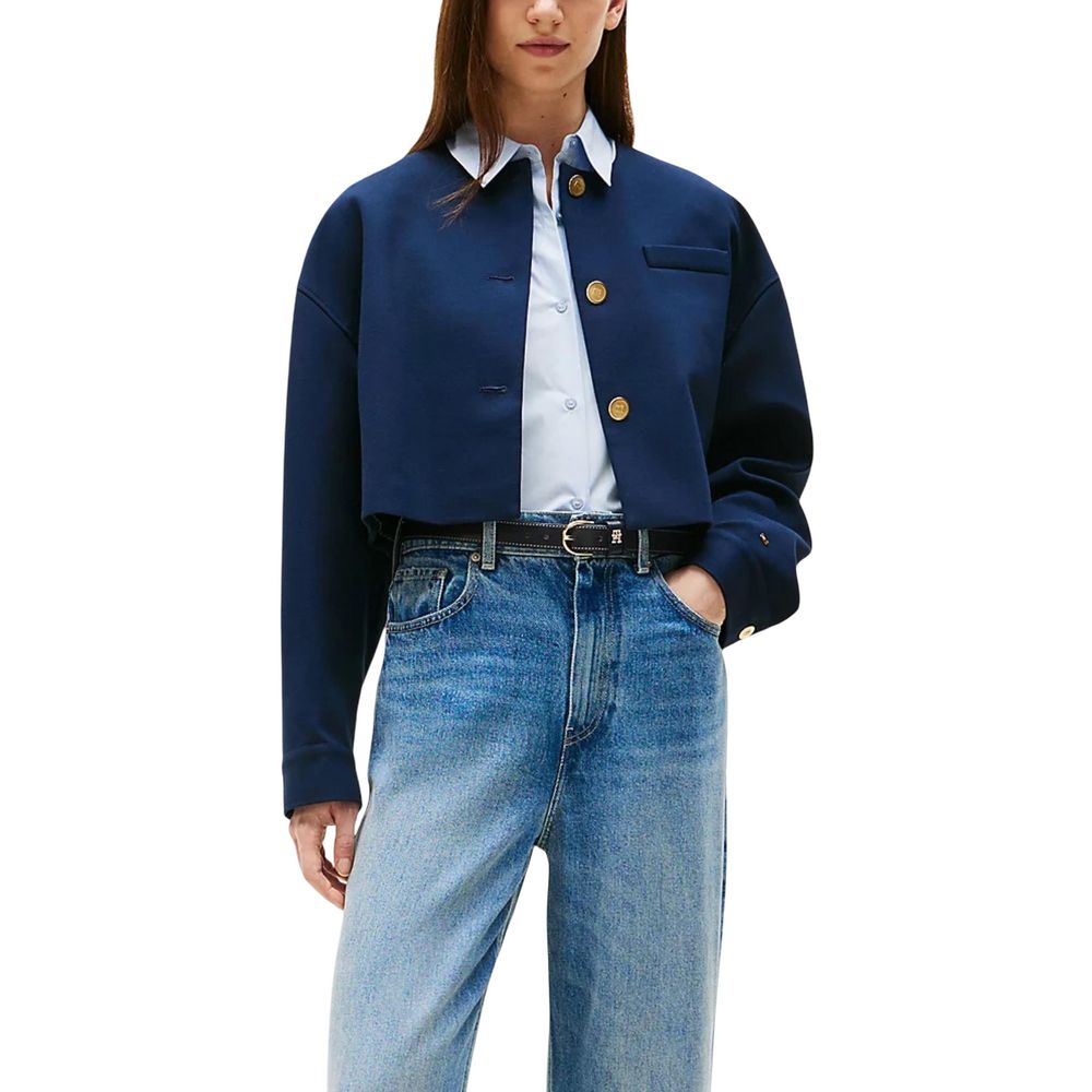 Blazer bleu en viscose de la marque Tommy Hilfiger, coupe élégante et moderne, porté sur un mannequin.