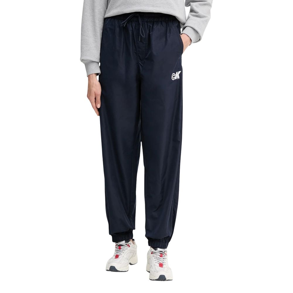 Pantalons de jogging Calvin Klein Jeans en polyester recyclé bleu, coupe décontractée, idéal pour l'entraînement et le confort.