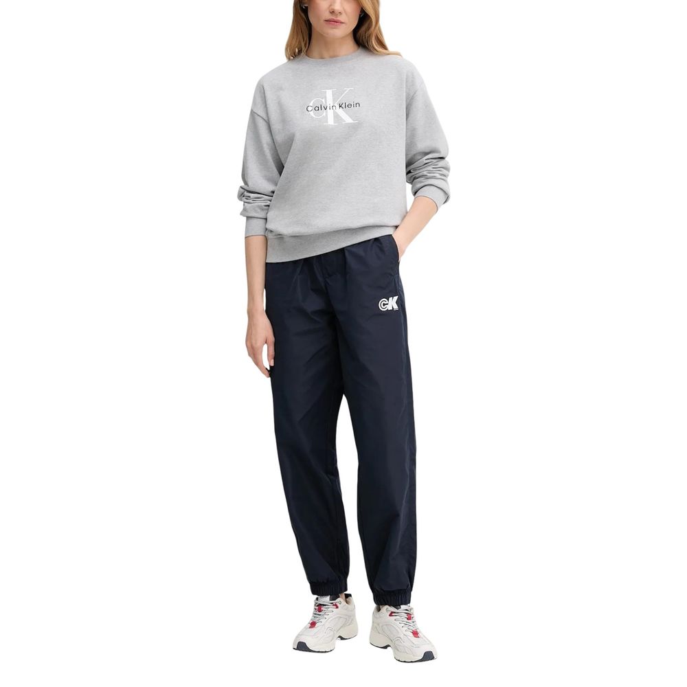 Pantalons de jogging Calvin Klein Jeans bleus en polyester recyclé, vêtements de sport confortables et tendance.