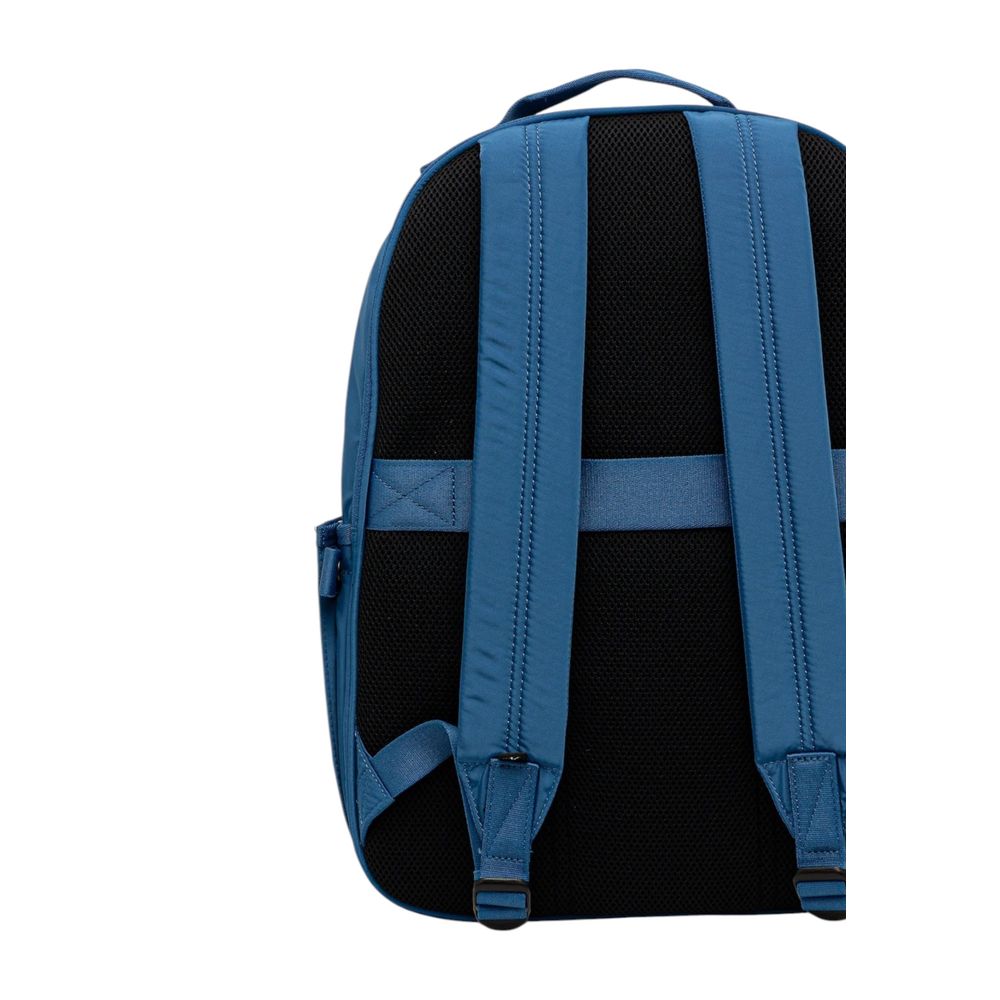 Sac à dos Calvin Klein en polyester recyclé bleu, avec compartiments et logo distinctif, pour un style pratique et écologique.